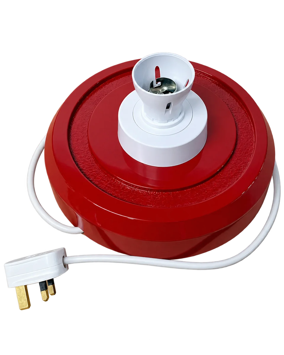 Red petrol pump globe base showing the B22 bayonet lampholder, white flex and UK plug
